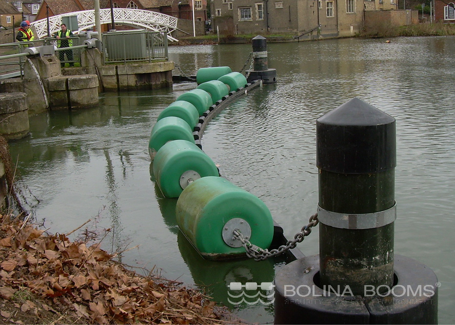 Chain safety booms in the waterway that have been used to restrain and protect watercraft that may have lost power or control from entering danger areas, such as weirs or sluices.