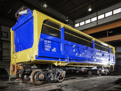 blue and yellow Side Dumper 2.0 (SD 2.0) wagon