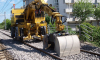 Front view of  Road Rail Loader in maintenance operation on the train track thumbnail