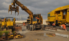 Road Rail Loader is Excavating and lifting railway tracks thumbnail