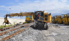 Side view of Road Rail Loader in maintenance operation on the train track thumbnail
