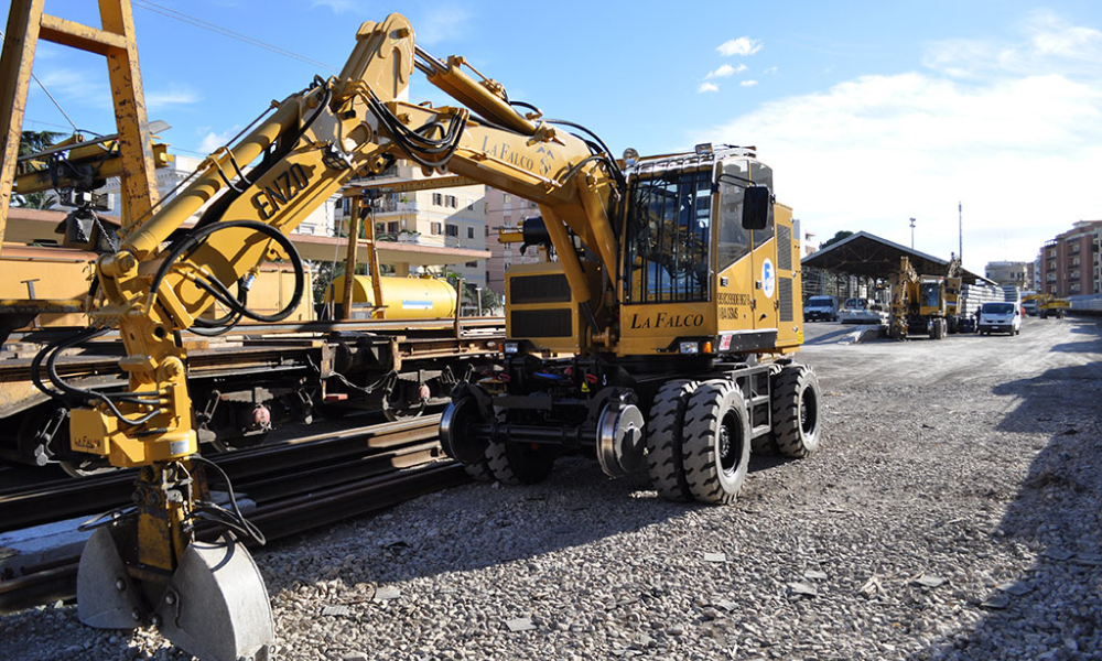 Road Rail Loader is Excavating and lifting railway tracks