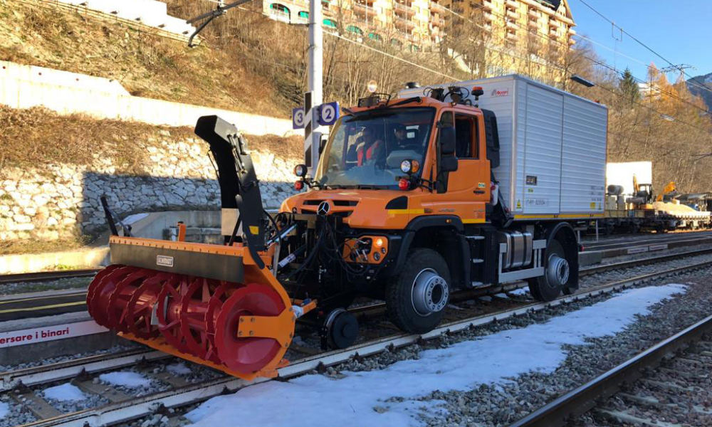 Road Rail Vehicles Fittings with snow plow on railway tracks