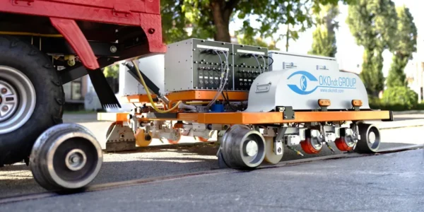 automated high-speed ultrasonic testing of rail