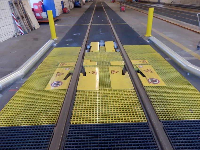 Railway wheel measurement system installed in a maintenance depot