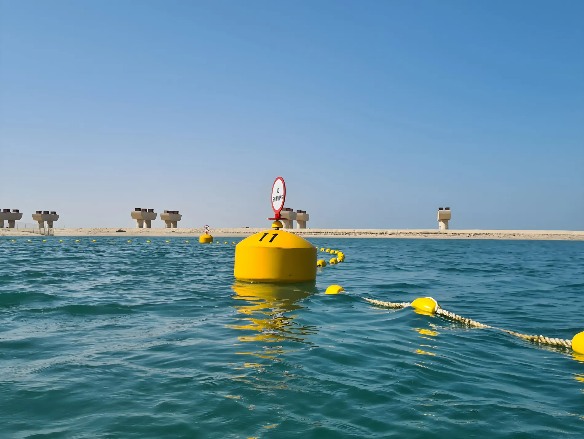 Marine mooring buoy with floating line