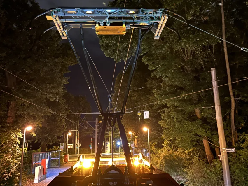 Contact wire wear measurement system inspecting catenary wires at night