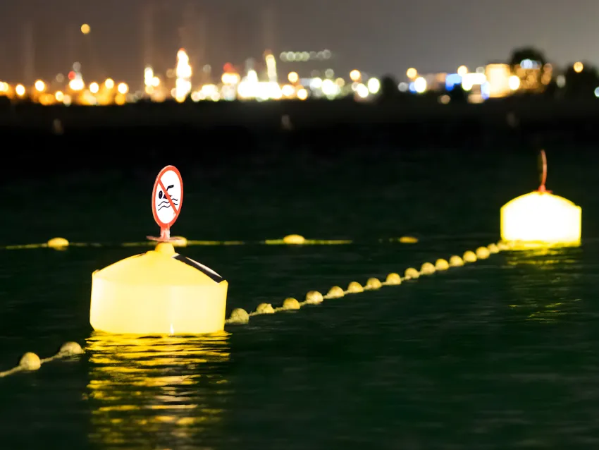 Lighted mooring buoy at night