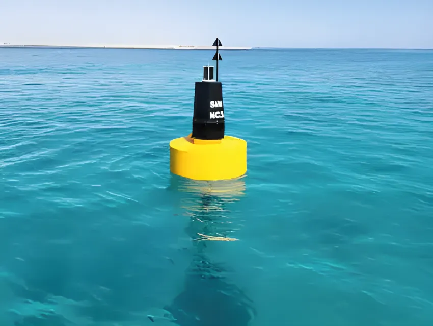 Navigation buoy floating in clear water