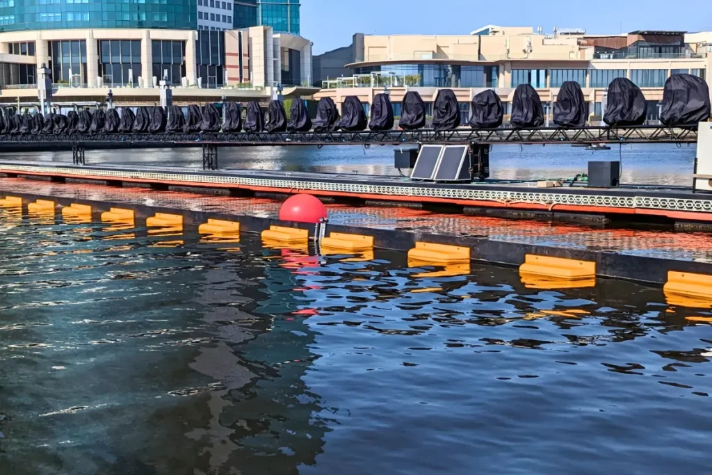 Permanent oil boom in marina water