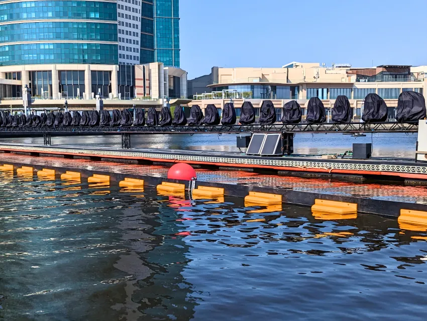 Permanent oil boom in marina water