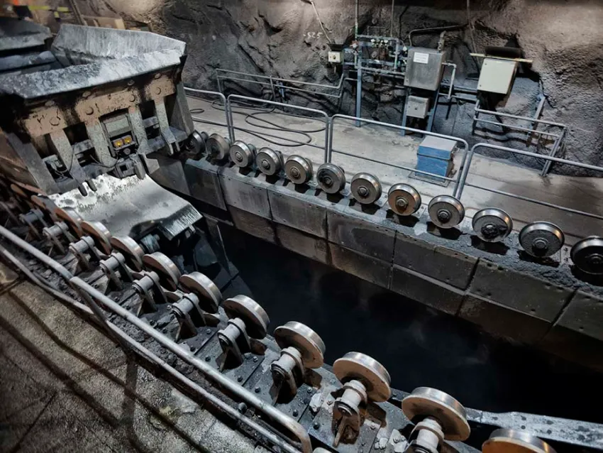 Rock dumper railcar in underground mine
