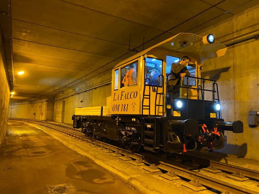 Railway shunter operating inside a tunnel for depot work, rail switching, and maintenance support.