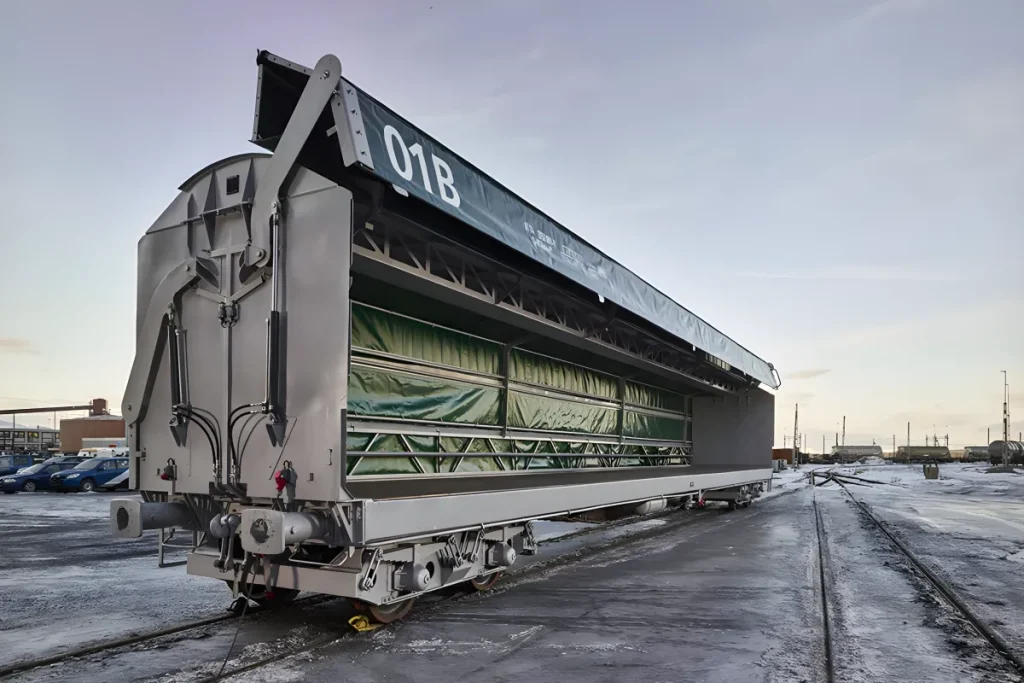 Side loader freight wagon on rail track