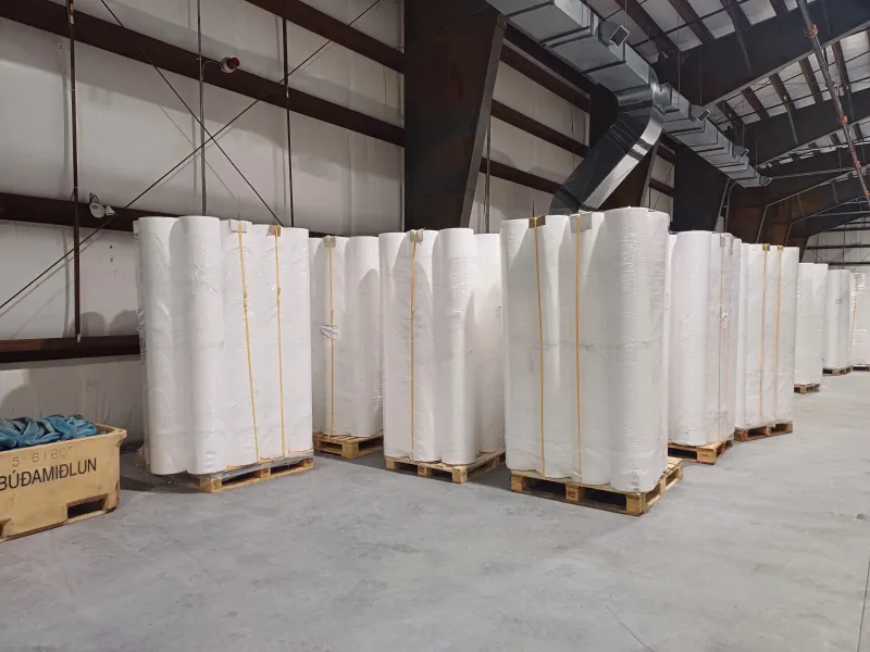 Silt curtains stored in rolls for marine sediment control projects.