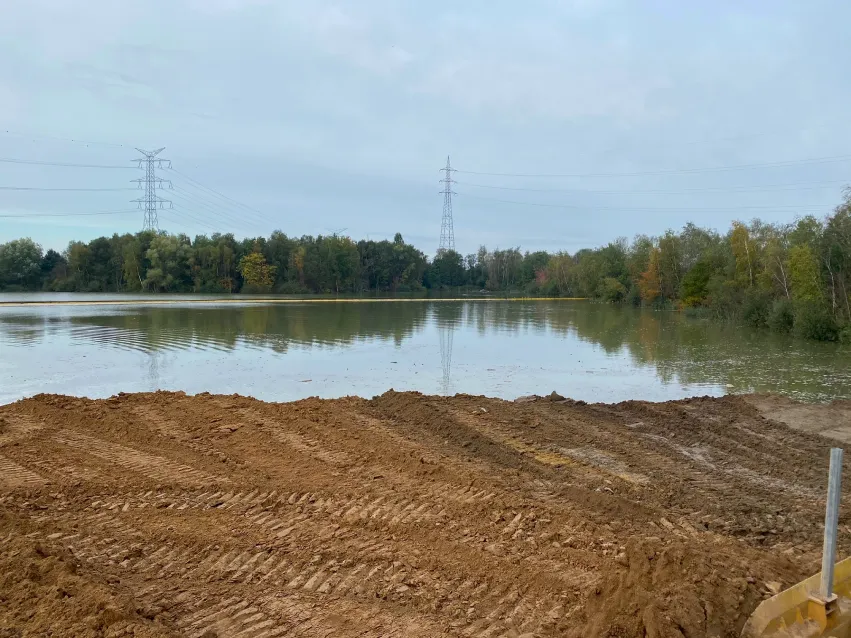 Silt curtain installed near shoreline for sediment control