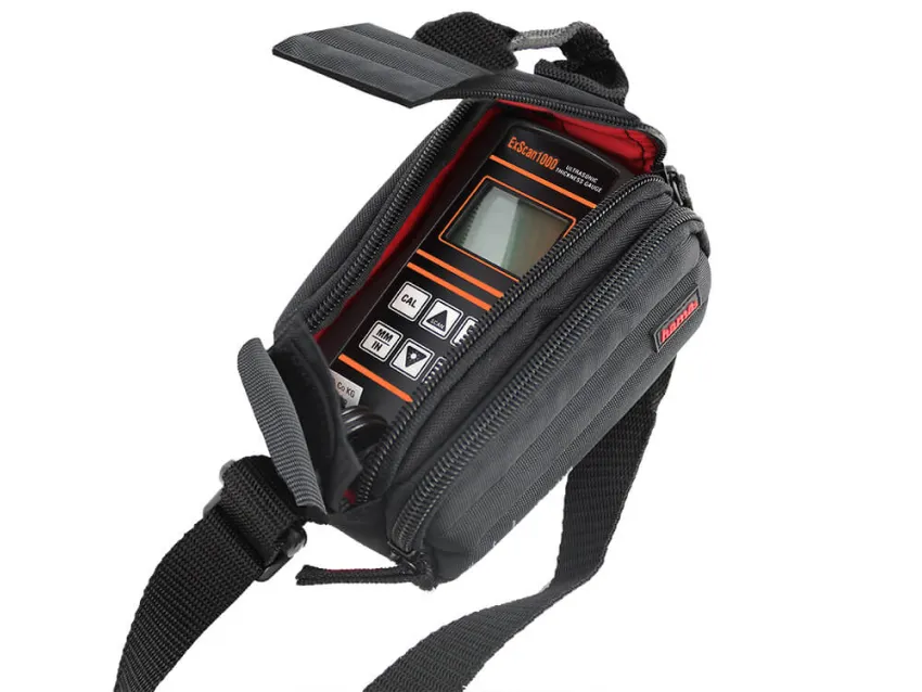 Ultrasonic thickness gauge in carrying case for NDT inspection