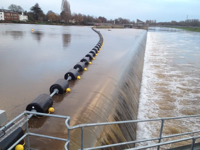 Watercraft Safety Boom installed near a dam for waterway barrier control